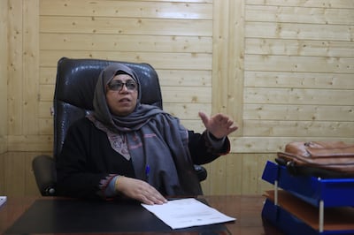 Dr. Adfar Yaseen, the head of the Kashmir TB Division, explaining the utility of "Cough Against TB" app at her office in Kashmir's main city Srinagar.