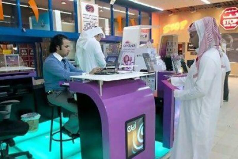 Zain Saudi Arabia posts its third consecutive quarterly loss. Above, a Zain information kiosk in Riyadh. Waseem Obaidi / The National