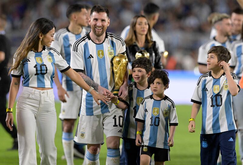 Argentina forward Lionel Messi celebrates with his wife Antonela Roccuzzo and their children Thiago, Mateo and Ciro. AFP