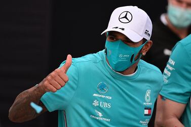 Formula One F1 - Emilia Romagna Grand Prix - Autodromo Enzo e Dino Ferrari, Imola, Italy - November 1, 2020 Race winner Lewis Hamilton as the Mercedes team celebrate winning the constructors championships Pool via Reuters/Miguel Medina