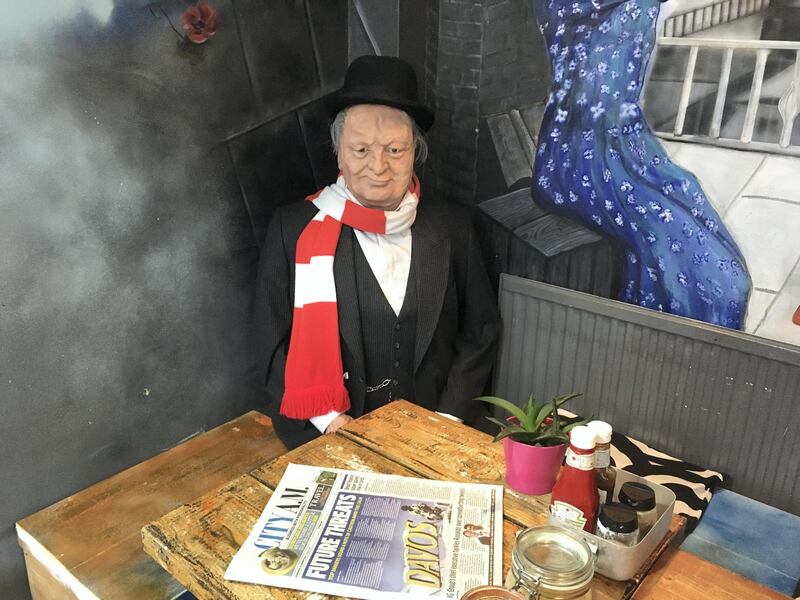 The Winston Churchill corner at the Blighty UK cafe in north London. Paul Peachey / The National