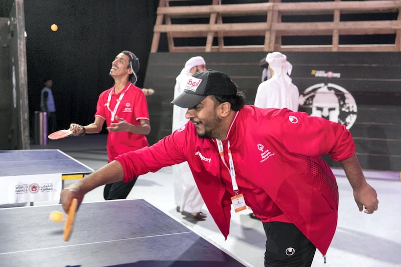 ABU DHABI, UNITED ARAB EMIRATES - OCTOBER 09, 2018. 

Special Olympics athlete Abdulnaser AlJabri plays ping pong with students attending Mohammed Bin Zayed Council for Future Generations, held at ADNEC.

(Photo by Reem Mohammed/The National)

Reporter: SHIREENA AL NUWAIS + ANAM RIZVI
Section:  NA