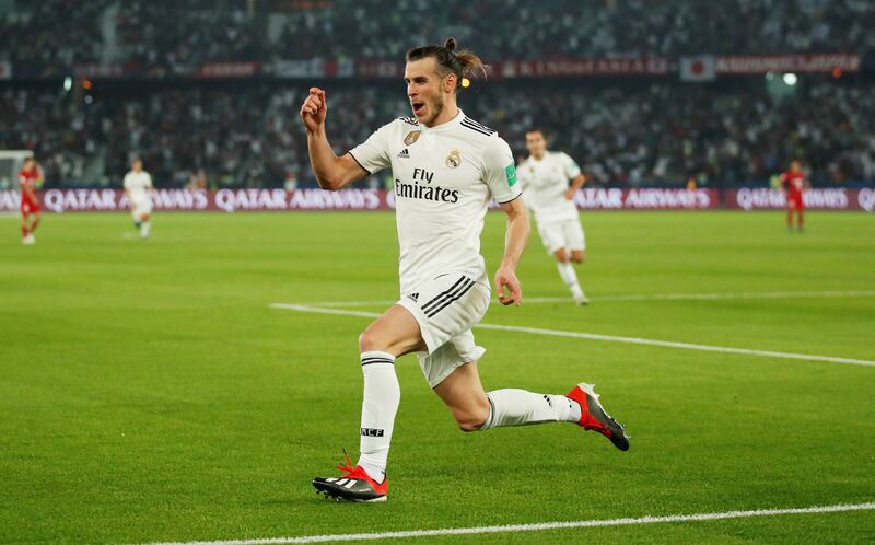 Soccer Football - Club World Cup - Semi-Final - Kashima Antlers v Real Madrid - Zayed Sports City Stadium, Abu Dhabi, United Arab Emirates - December 19, 2018  Real Madrid's Gareth Bale celebrates scoring their second goal   REUTERS/Andrew Boyers