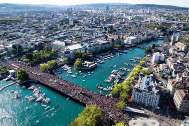 epa06943594 An aerial view shows hundreds of thousands of people participanting in the 27th Street Parade in Zurich, Switzerland, 11 August 2018. The annual dance music event Street Parade runs this year under the claim 'Culture of Tolerance'. EPA-EFE/ENNIO LEANZA