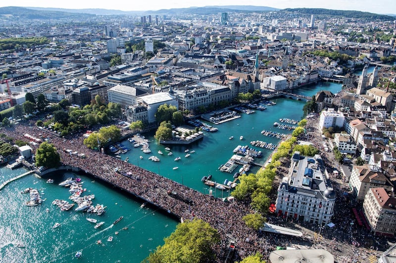 epa06943594 An aerial view shows hundreds of thousands of people participanting in the 27th Street Parade in Zurich, Switzerland, 11 August 2018. The annual dance music event Street Parade runs this year under the claim 'Culture of Tolerance'.  EPA-EFE/ENNIO LEANZA  *** Local Caption *** 54547217