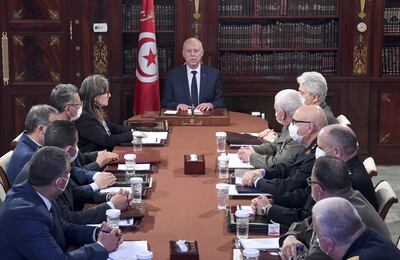 Tunisia's President Kais Saied chairs a National Security Council meeting on March 30. He dissolved parliament and said MPs would be prosecuted. AFP 