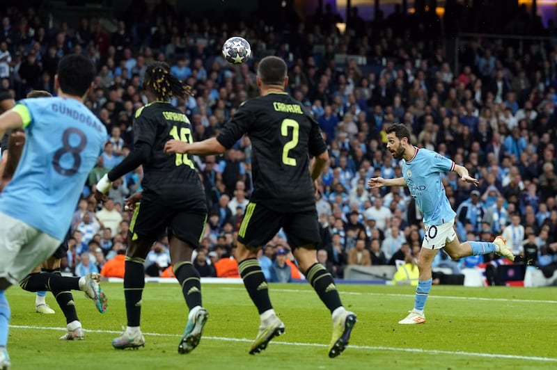 Manchester City's Bernardo Silva scores their second goal. PA 