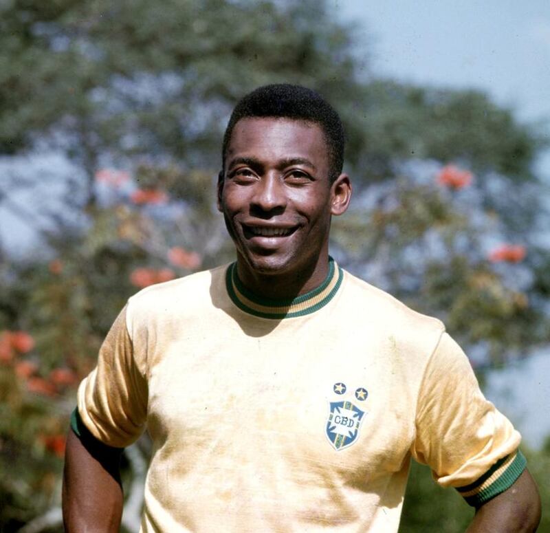 Brazil player Pele models the yellow shirt in 1970. Getty Images