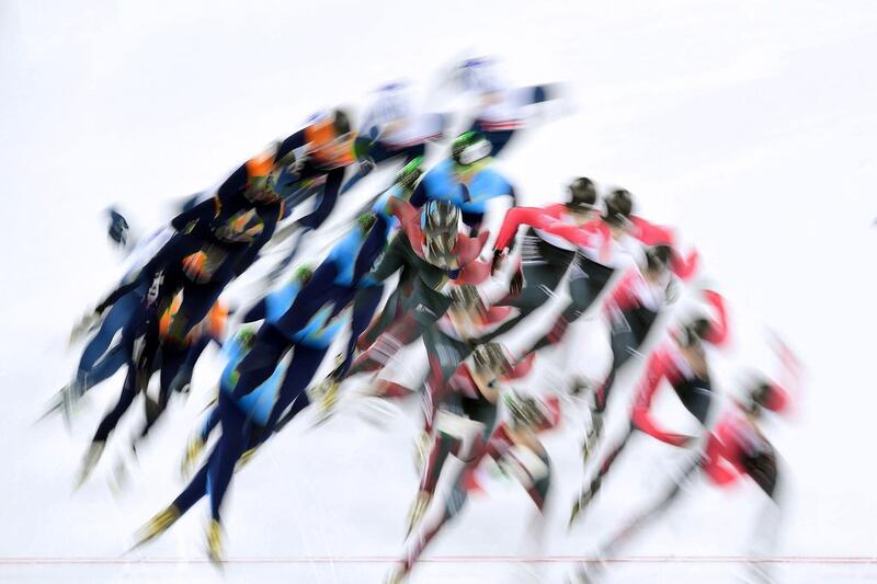 A multiple exposure picture shows athletes competing in the men’s 500m semifinal at the ISU World Cup Short Track speed skating event in Shanghai. Johannes Eisele / AFP