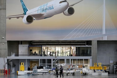 FILE PHOTO: An advertising poster for Airbus is pictured at the Airbus A330 final assembly line at Airbus headquarters in Colomiers, near Toulouse, France, November 26, 2018. REUTERS/Regis Duvignau/File Photo