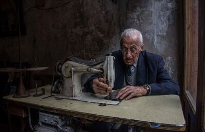 Lebanese photographer Zeinab Khalifeh won the adult's category with this picture of a tailor in Saida. Courtesy National Geographic Abu Dhabi
