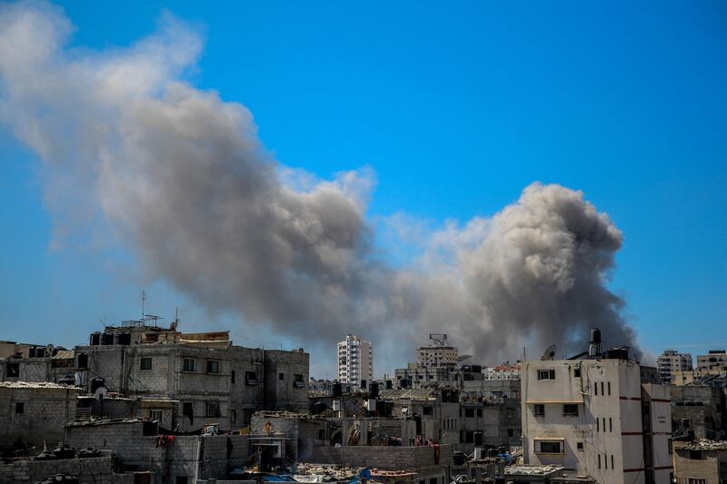 Smoke billows after Israeli bombardment in the vicinity of the Al Shifa Hospital in Gaza city. AFP