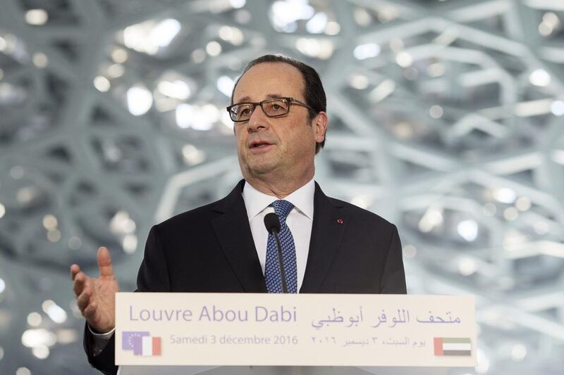 François Hollande, president of France, speaks to journalists while touring the Louvre Abu Dhabi construction site. Christopher Pike / The National



