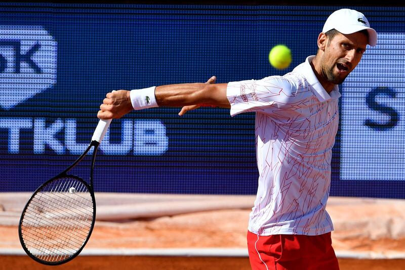 Serbian tennis player Novak Djokovic returns the ball to German Alexander Zverev during their match at the Novak Djokovic's Balkans charity tennis tournament in Belgrade. AFP