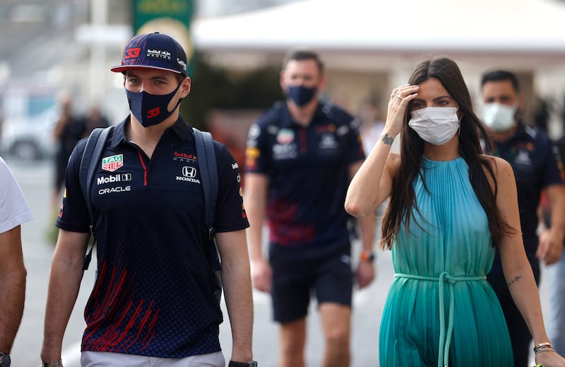 Verstappen arrives at the circuit with his girlfriend Kelly Piquet. Reuters