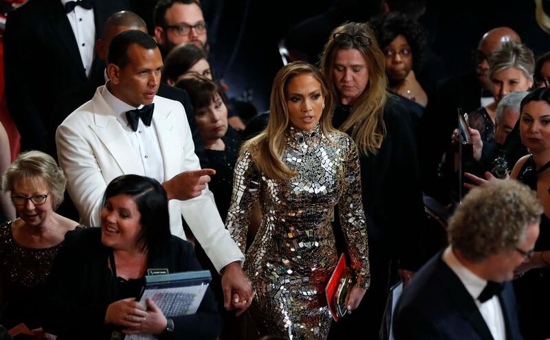 Jennifer Lopez and Alex Rodriguez arrive at the show. Photo: Reuters