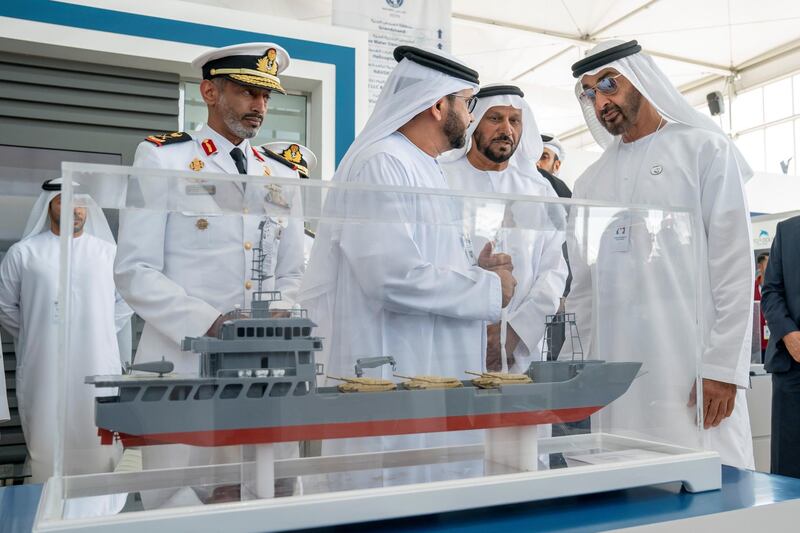 ABU DHABI, UNITED ARAB EMIRATES - February 20, 2019: HH Sheikh Mohamed bin Zayed Al Nahyan, Crown Prince of Abu Dhabi and Deputy Supreme Commander of the UAE Armed Forces (R) visits Al Fattan Ship Industry stand, during NAVDEX, at Abu Dhabi National Exhibition Centre (ADNEC). Seen with Rear Admiral Pilot HH Sheikh Saeed bin Hamdan bin Mohamed Al Nahyan, Commander of the UAE Naval Forces (L).
( Ryan Carter for the Ministry of Presidential Affairs )
---