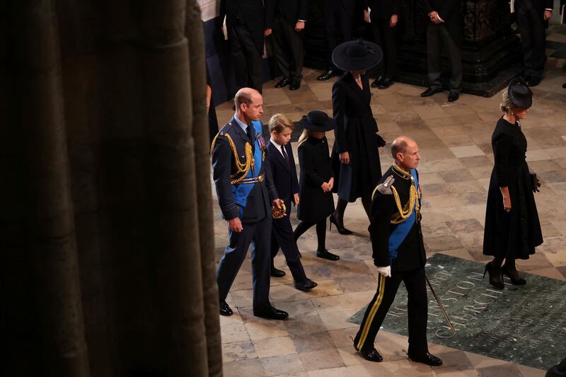 Prince William, his wife Catherine, the Princess of Wales, and their children Prince George and Princess Charlotte arrive at Westminster Abbey. AP