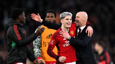 MANCHESTER, ENGLAND - MARCH 17: Kobbie Mainoo and Alejandro Garnacho celebrate victory with Erik ten Hag, Manager of Manchester United, after the Emirates FA Cup Quarter Final between Manchester United and Liverpool FC at Old Trafford on March 17, 2024 in Manchester, England. (Photo by Michael Regan / Getty Images)