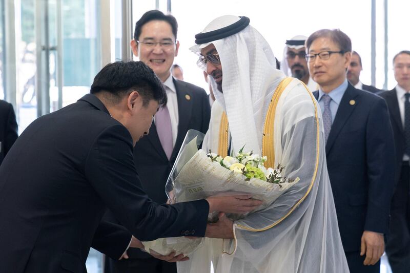 HWASEONG CITY, REPUBLIC OF KOREA (SOUTH KOREA)  - February 26, 2019: HH Sheikh Mohamed bin Zayed Al Nahyan, Crown Prince of Abu Dhabi and Deputy Supreme Commander of the UAE Armed Forces (R), is presented with flowers upon his arrival at the Samsung Electronics Semiconductor Research and Development Centre.

( Ryan Carter / Ministry of Presidential Affairs )
---