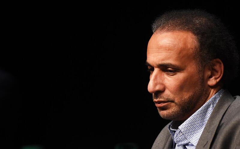 (FILES) In this file photo taken on March 26, 2016, Swiss Islamologist Tariq Ramadan takes part in a conference on the theme "Live together", in Bordeaux. / AFP / MEHDI FEDOUACH
