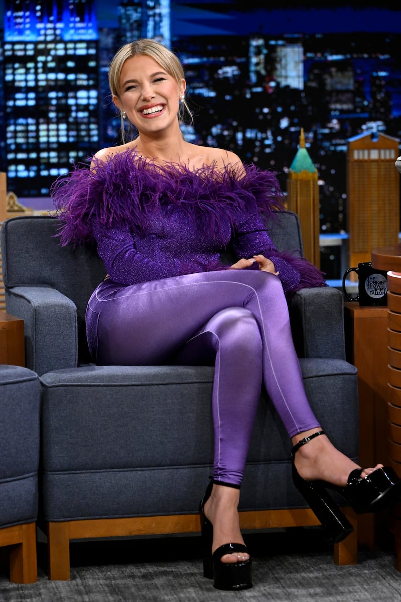 Millie Bobby Brown, wearing purple Raisa Vanessa, while appearing on the 'Tonight Show Starring Jimmy Fallon' on May 13, 2022. Getty Images
