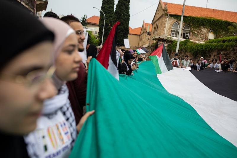 tudents were demanding the school administration end all economic ties “with companies and institutions complicit in the Israeli occupation of Palestinians”.