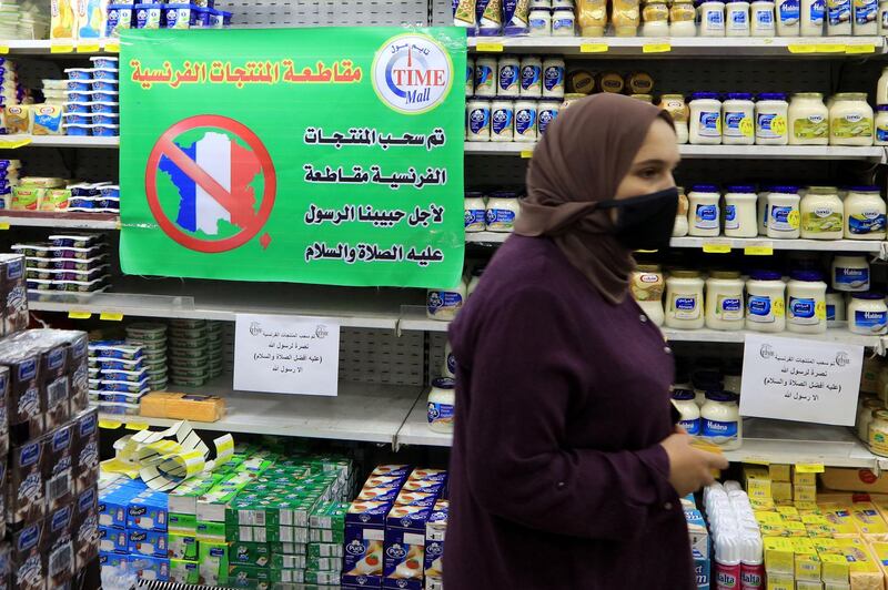 epa08774697 A spot of French products is covered with a placard reading in Arabic 'French products are being boycotted for the sake of the Prophet Muhammad peace upon him', in a supermarket in Amman, Jordan, 26 October 2020. Many people in Jordan called on social media for the boycott of French products as a show of support for Muslims Prophet Muhammad two day before the celebration of the Prophet birthday Mawlid Nabawi on 29 October. The protest call comes amid rising tension in response to French President Macronâ€™s comments following the recent beheading of a teacher in France after he had shown cartoons of the Prophet Muhammad in class. Macron vowed his country would not give up publishing such cartoons  EPA/STR