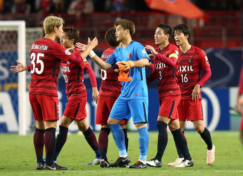 epa07138644 Players of Kashima Antlers celebrate after defeating Persepolis FC of Iran in the first leg of the AFC Champions League 2018 final at Kashima Stadium in Kashima, Ibaraki Prefecture, Japan, 03 November 2018.  EPA/JIJI PRESS JAPAN OUT EDITORIAL USE ONLY/  NO ARCHIVES