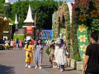 Visitors at Dubai Miracle Garden on October 10. Antonie Robertson / The National

