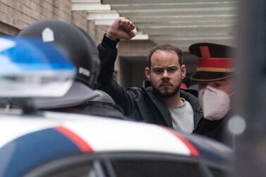 epa09015687 Rapper Pablo Hasel (C) gestures as Catalan local police arrest him at Lleida University, where he has been sheltering with his supporters, in Lleida, Catalonia, Spain, 16 February 2021. Hasel was sentenced in late January to jail to nine months and one day after the Supreme Court found him guilty of glorifying terrorism and insulting the crown and state institutions. The sentence triggered rallies of Rights Associations asking for free speech and government's political parties, Unidas Podemos and Socialist Party, to reform the criminal code for crimes involving freedom of expression during the law known as 'Gag law'. EPA/RAMON GABRIEL