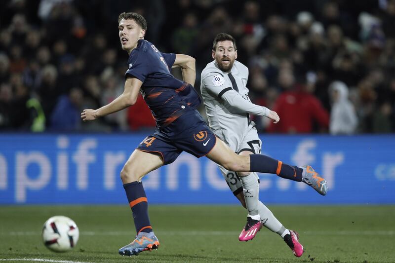 Paris Saint Germain's Lionel Messi and Montpellier's Maxime Esteve in action. EPA