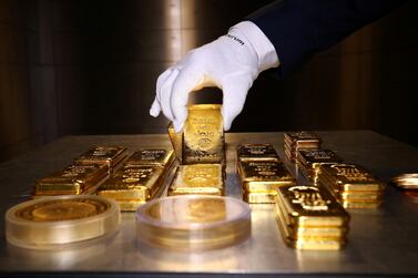 Gold bars and coins are stacked in the safe deposit boxes room of the Pro Aurum gold house in Munich, Germany. The precious metal is about $50 from its all-time high of $1920.30 last seen in September 2011. Reuters
