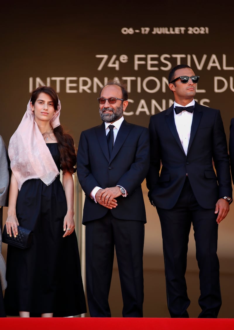 Asghar Farhadi, Amir Jadidi and Sarina Farhadi attend the screening of 'A Hero' during the 74th annual Cannes Film Festival on July 13, 2021