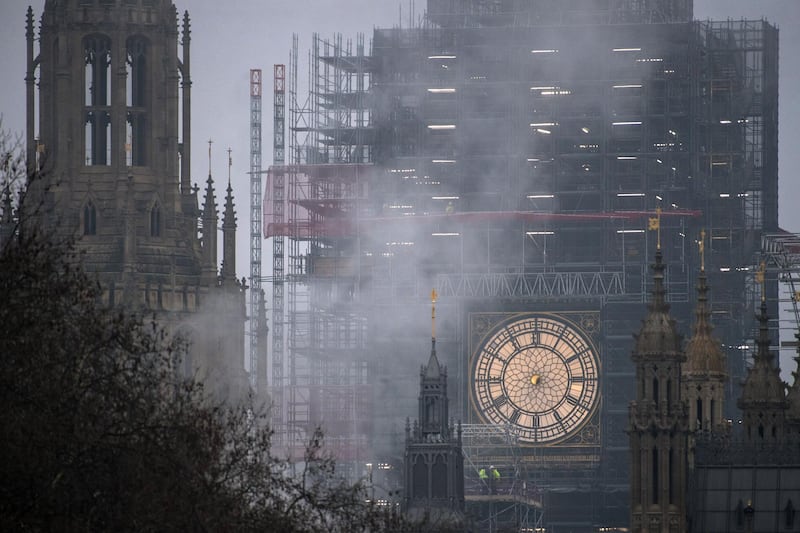 A clock face on Elizabeth Tower, commonly known as Big Ben, is seen without its hour and minute hands as conservation work continues on the Houses of Parliament  in London, England. Chris J Ratcliffe / Getty Images