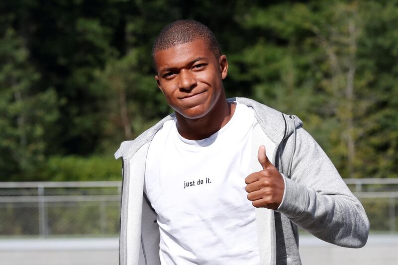 Soccer Football - 2018 World Cup Qualifications - Europe - France Training - Clairefontaine, France - August 28, 2017   France's Kylian Mbappe arrives before training   REUTERS/Gonzalo Fuentes