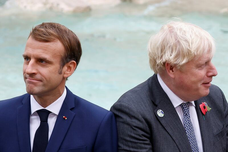 Britain's Prime Minister Boris Johnson and French President Emmanuel Macron in Rome for the G20 summit on Sunday. Photo: Reuters
