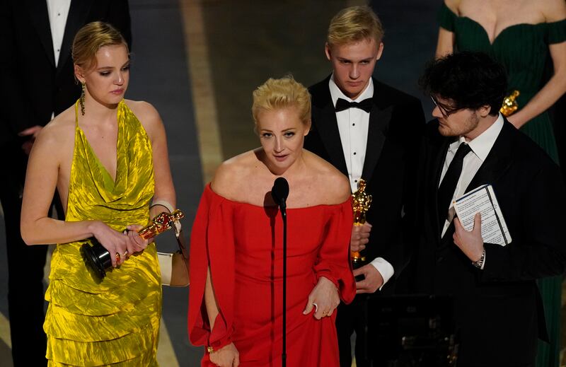 Yulia Abrosimova, wife of Alexei Navalny, makes a speech on his behalf at the 95th Academy Awards. AP