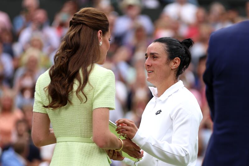 Ons Jabeur of Tunisia is consoled by the Princess of Wales, following her defeat to Marketa Vondrousova in the Wimbledon final. Getty
