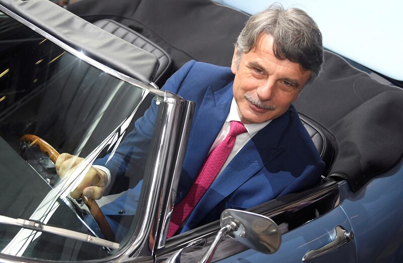 Ralf Speth, CEO of Jaguar Land Rover sits in a classic Jaguar E-Type modified with an electric engine at their 'Tech Fest'  in London, September 7, 2017. REUTERS/Toby Melville