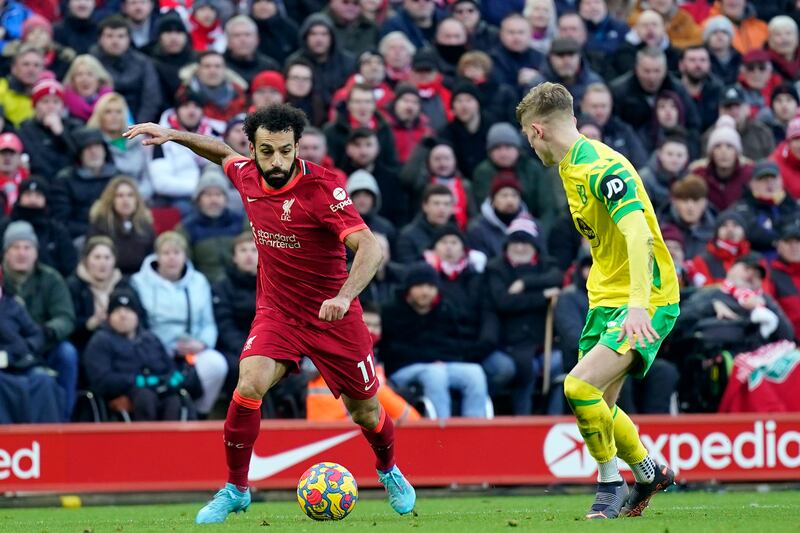 Liverpool's Mohamed Salah takes on Norwich's Brandon Williams at Anfield. EPA