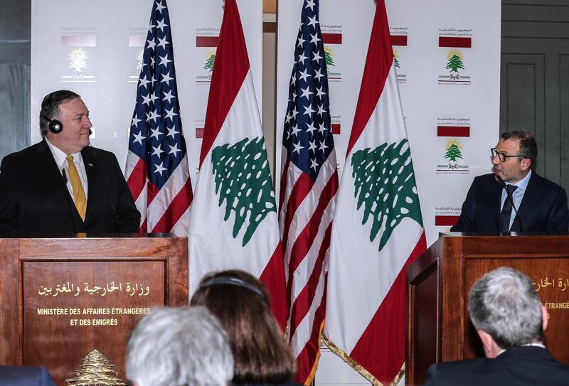 epa07456497 US Secretary of State Mike Pompeo (L) and Lebanese Foreign Minister Gibran Basil (R) give a joint press conference at the Foreign Ministry in Beirut, Lebanon, 22 March 2019. Pompeo arrived in Beirut on the last leg of his five-day Mideast tour that also took him to Kuwait and Israel.  EPA/NABIL MOUNZER