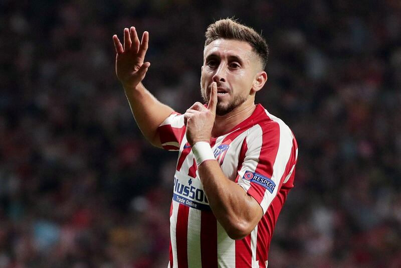 Atletico Madrid's Hector Herrera celebrates scoring their second goal to make it 2-2, the final result. Reuters