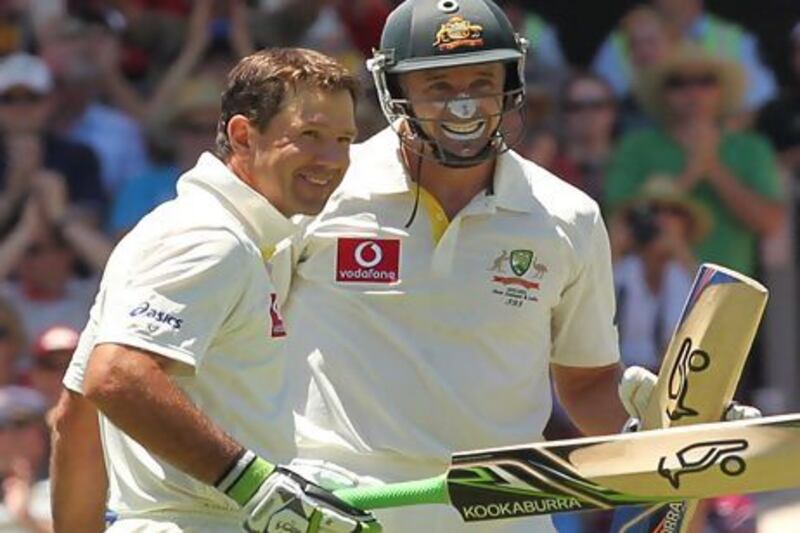 Ricky Ponting, left, and Mike Hussey retired from Tests last year, leaving Australia's batting line-up with very little experience. Tony Ashby / AFP