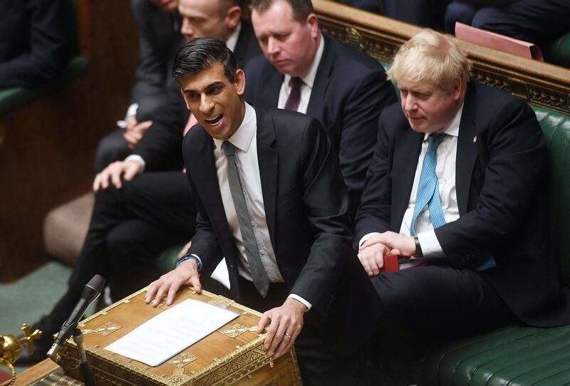 Rishi Sunak will have to get a deal past Tory MPs, including his predecessor Boris Johnson. AFP