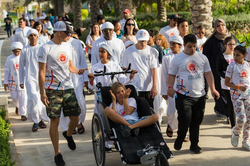 An athletic walk that includes everyone regardless of their physical and mental abilities took place at Umm Al Emarat Park. Special Olympics