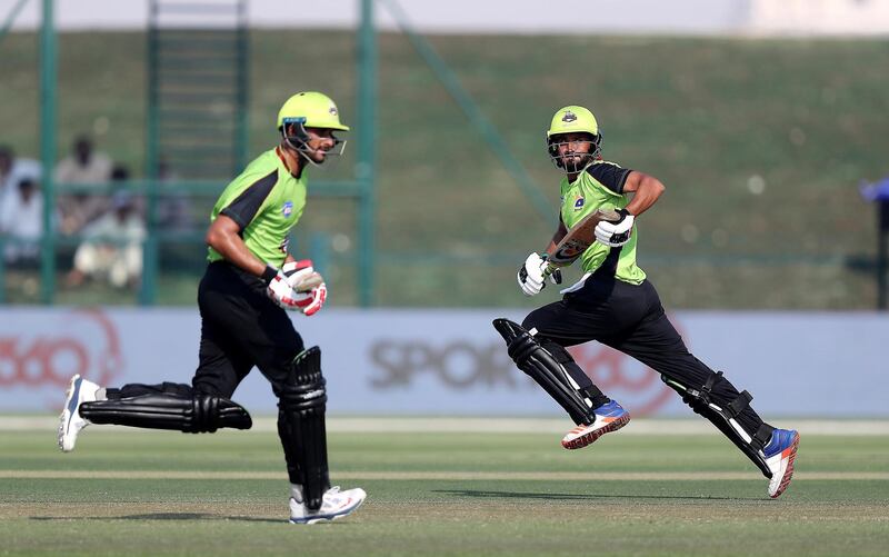 ABU DHABI , UNITED ARAB EMIRATES, October 05, 2018 :- Left to Right ��� Sohail Akhtar and Mohammad Faizan of Lahore Qalanders running between the wickets during the Abu Dhabi T20 cricket match between Lahore Qalanders vs Hobart Hurricanes held at Zayed Cricket Stadium in Abu Dhabi. ( Pawan Singh / The National )  For Sports. Story by Amith