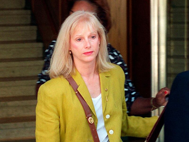 FILE - In this Sept. 11, 1996 file photo, Sondra Locke leaves court in Burbank, Calif., after opening statements in a civil suit against Locke's former live-in boyfriend, Clint Eastwood. The Oscar-nominated actress Locke has died. A death certificate obtained by The Associated Press shows Locke died Nov. 3, 2018, at age 74 at her home in Los Angeles of cardiac arrest stemming from breast and bone cancer. (AP Photo/John Hayes, File)