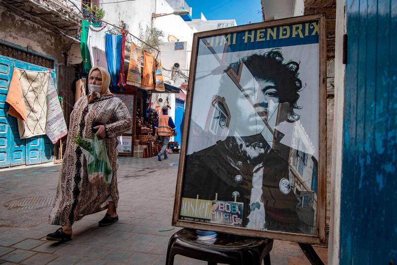 A picture taken in the Moroccan coastal city of Essaouira shows portraits of late US guitarist Jimi Hendrix.  AFP