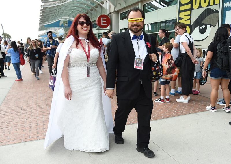 Aubrey Heringes, left, and Brennan Lin, are dressed as Jean Gray and Cyclops from the X-Men wedding scene. AP Photo
